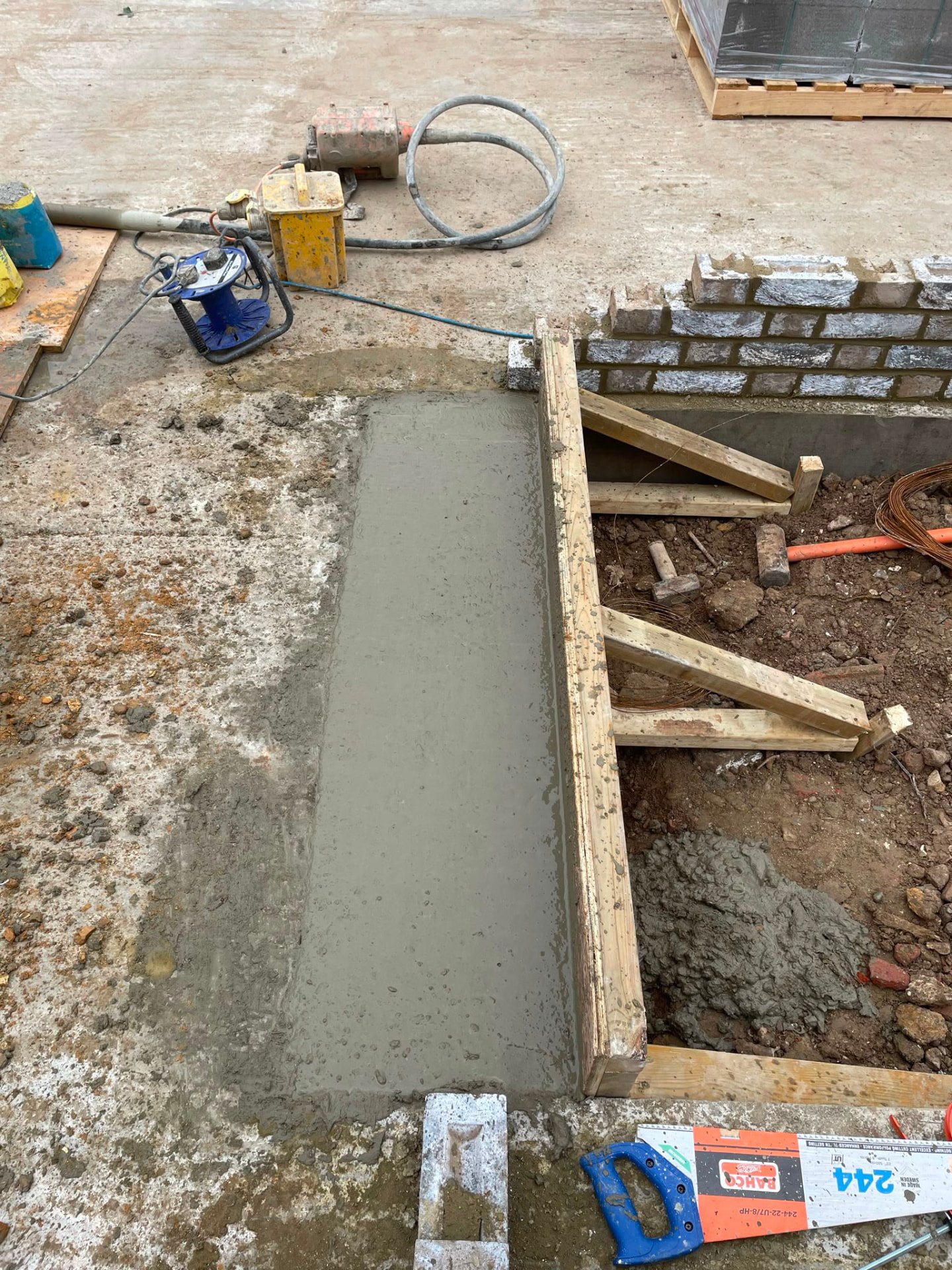 Freshly poured concrete section forming part of the RC raft remedial works at Marlow